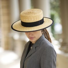 Introducing our Bolero Straw Hat, a timeless accessory handcrafted with care.  With its wide brim design, this boater straw hat is a versatile addition to any wardrobe, perfect for both women and men alike.  Crafted from high-quality natural straw, it offers a lightweight and breathable option for those sunny days. Whether you're strolling along the beach or enjoying a garden party, this elegant hat adds a touch of sophistication to any ensemble. Say hello to effortless style and sun protection Natural Summer Hat For Formal Occasions, Classic Boater Hat With Curved Brim For Spring, Classic Wide Brim Top Hat For Spring, Formal Toquilla Straw Boater Hat With Flat Brim, Formal Flat Brim Boater Hat In Toquilla Straw, Formal Straw Panama Hat With Flat Brim, Classic Brimmed Boater Hat For Spring, Formal Panama Hat With Flat Crown For Spring, Formal Panama Hat With Flat Crown