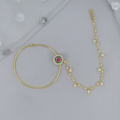 Look stunning with this gorgeous gold Kundan Bridal Nath/ Nose Ring with chain.  Enhace your either Modern or Traditional Bridal look.   Dimension:  6cm approx. We try to take photos as naturally as we can, but color can be slightly vary due to lighting.  Jewelry Care -- Keep all the jewelry away from water, perfumes, and other harsh chemicals Please note: No Returns No Exchange. But If you have any issue with your order, Kindly contact us before leaving a review Gold-tone Pearl Chain Wedding Jewelry, Gold Hoop Chain Jewelry, Gold-tone Wedding Jewelry With Adjustable Chain, Gold Plated Hoop Pearl Chain Jewelry, Gold Chain Jewelry For Celebration, Gold Plated Hoop Jewelry For Wedding, Traditional Gold Chain Jewelry For Wedding, Gold-plated Hoop Wedding Jewelry, Gold-tone Dangle Jewelry For Weddings