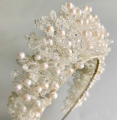 DETAILS | A beautiful full bridal tiara featuring branches of freshwater pearls, seed beads, and mixed crystals. STYLING |  The Cate tiara crown would perfectly sit in any hair style whether you choose a loose tousled style or a structured up do.   MEASUREMENTS | The main feature of this design measures approximately 25-20cm in length around the band and 6-7cm in height at the central highest point.  The height of this design can be customised to suit your preference.  CATE is a larger version o Pearl Tiara Wedding, Headdress Wedding, Floral Wedding Hair, Pearl Bridal Headband, Bead Hair Accessories, Wedding Headdress, Crystal Hair Accessories, Pearl Tiara, Tiara Wedding