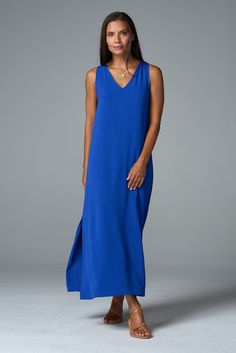 Our best-selling maxi dress is a summer staple. From weekend brunch to beach weddings, you'll wear this flowing style everywhere this season. ✓ All-Day Comfort ✓ Travel Friendly ✓ Day to Night ✓ Machine Washable DETAILS V neck Side slits FIT Regular fit True to size Model is 5'8" and wears size S MEASUREMENTS Length: 52" from shoulder (size S) FABRIC + CARE 100% polyester airflow Cold water wash on delicate. Line dry. Santorini Dress, Dresses Royal, Weekend Brunch, Instagram Outfits, Outerwear Outfit, Capri Blue, Beach Weddings, Coral Blue, Summer Staples