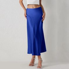 This Seasonal Fave Satin Long Midi Skirt is the new power player in our wardrobe! Features a high waistline, a figure-skimming silhouette with side pleated details for a chic look, and a flowy midi hem Comes in eight colors Made from quality Polyester Available in sizes S-L Model is wearing size S Elegant Cocktail Party, Long Silk Skirt, Korean Fashion Skirt, Plus Size Satin, Long Midi Skirt, Slim Fit Skirts, Silk Midi Skirt, Long Midi, Womens Knit Dresses