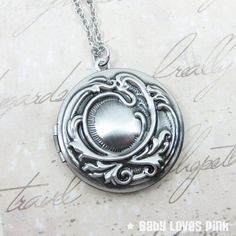 Beautiful floral pattern vintage locket on an antique silver necklace.♥ Antique silver locket measures approx. 33mm♥ 18" Antique silver cable chain necklace♥ Always gift wrapped ♥______________________________________________________________♥ Visit our shop: BabyLovesPink.etsy.comFollow Baby Loves Pink on:Instagram @babylovespinkFacebook.com/babylovespink Silver Pendant Locket Necklace With Vintage Charm, Vintage Antique Silver Locket Necklace Nickel Free, Vintage Metal Locket Necklace Nickel Free, Vintage Nickel Free Antique Silver Locket Necklace, Antique Silver Round Locket Necklace Nickel Free, Silver Locket Necklace With Vintage Charm, Adjustable Silver Locket Necklace Nickel Free, Nickel Free Silver Medallion Locket Necklace, Vintage Antique Silver Locket Necklace