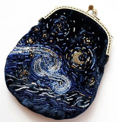 a purse with an image of the starry night on it