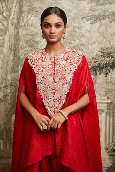 Red silk textured asymmetric kaftan featuring lampi embroidered floral vine motifs, embellished by pearl and sequins. Comes with asymmetric pant. - Aza Fashions Red Embroidered Kaftan For Wedding, Red Embroidered Wedding Kaftan, Elegant Red Hand-embellished Dupatta, Elegant Red Kaftan With Intricate Embroidery, Festive Red Kaftan With Intricate Embroidery, Elegant Red Kaftan With Traditional Drape, Festive Evening Kaftan With Intricate Embroidery, Festive Pearl Embroidered Kaftan, Elegant Embellished Red Kaftan