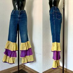 80s Vintage Hippie Extra Bell Bootoms Trousers Hip Hop Purple Yellow Layer Flare Leg Pants Festival Trousers Mid Waist Pants Size L XL ♥ Zipper and 1 button closure on front ♥ Bell Bootoms ( Hand Made) ♥ 2 Pockets on sides, 2 on back Condition: Vintage condition: Good Vintage Condition. Tag: Hand Made Materials: 100% Cotton Size: ( Fit on M/ L) Made from Men's pants with size W 40 L 36 Measurements: laying flat and tied closed Length: 109cm = 42,9'' Waist : 92+cm = 36,2'' Hips: 106cm = 41,7'' Tr Vintage Spring Festival Pants, Vintage Fitted Bottoms For Festival, Vintage Style Wide Leg Festival Bottoms, Vintage Wide Leg Festival Bottoms, Vintage Wide Leg Bottoms For Festival, Retro Purple Spring Bottoms, Vintage High Waist Multicolor Pants, Retro Wide Leg Pants For Festival, Vintage Cotton Bottoms For Festival