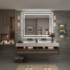 a bathroom with a large mirror above the sink