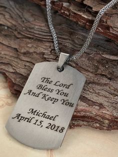 "This personalized Boys First Communion necklace features a high-quality shiny stainless steel dog tag shaped pendant engraved with \"First Holy Communion\", plus young man's name and Communion date. Optional personal message on the back. See photos for examples. The dog tag measures 43mm x 24mm (1.7\" x 1\") and comes on a handsome 17.5\" stainless steel lantern chain. The perfect gift for a special young man on his First Communion day! Comes ready for gift giving in a white cotton-lined gift b Boys Cross Necklace, Communion Invitations Boy, Black Cross Necklace, Baptism Gifts For Boys, Boys First Communion, Bible Verse Necklace, Personalized Cross Necklace, Necklace With Name, Tiny Cross Necklace