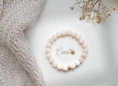 Elegant and simple with jade and lava pearls.❤ Diffuser bracelet consisting of faceted jade in pale powder, white lava beads and a hematite bead in gold. Add 1-2 drops of essential oil to the lava beads and The scent will stay with you for 1-3 days, depending on which oil was used. ❤ Stretch bracelet, adapts to the wrist ❤ Small: 16 cm, Medium: 17, 18 cm, Large: 19 cm ❤ Number of beads depends on the size of the bracelet ❤ Pearl Ø : 8 mm ❤ Nickel free ❤ Handmade by me ❤ Elegant packaging Essential Oils Diffuser, Oil Diffuser Bracelet, Essential Oil Diffuser Bracelet, Hippie Bracelets, Lava Beads, Diffuser Bracelets, Hematite Beads, Lava Bead, Essential Oil Diffuser