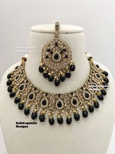 Antique Polki Necklace Set comes with earrings and tikka / Indian Jewelry/ High Quality Kundan and Polki Jewelry/ Bollywood Jewelry/Wedding Jewelry/dull  gold/Black  All items are shipped from Brampton, Ontario, Canada. If you need your item by a certain day, please reach out to us for express delivery option before placing the order so that we can update the shipping for you. Standard shipping/delivery timeline Below are the estimated delivery times after the order is shipped/dispatched.  ---> USA delivery timeline * 3-5  business days to major urban centers in USA. It may take 2-3 days extra to remote locations ---> Canada delivery timeline  * 2-3 business days - GTA  & Montreal  * 2-4  business days - Rest of Ontario/Quebec * 4-6 business days-  Rest of Canada (Please consider 1-2 extra Polki Necklace Set, Brampton Ontario, Necklace Set Indian, Polki Necklace, Polki Jewellery, Bollywood Jewelry, Jewelry Black, Gold Necklace Set, Hand Jewelry