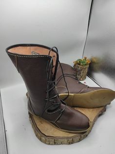 This is handstitched genuine leather custom made men's boots. Our processing time 2-10 bussines days, But must of time we are shipping your order very earlier. ( express shipping, Fedex, Ups, Dhl, Tnt ) There is every size available custom made. There is also other colors. %100 naturel leather Leather soled. Fits both men and women Very comfy and healty. Wehave door to door express shipping service. If you have any question please contact with us. bemyboots.etsy.com Our second shop for vintage h Medieval Style Brown Lace-up Boots, Medieval Brown Lace-up Boots, Medieval Brown Boots With Leather Sole, Medieval Brown Outdoor Boots, Viking Style Leather Boots With Round Toe, Viking Leather Lace-up Boots, Viking Leather Boots With Leather Sole, Viking Style Lace-up Leather Boots, Boots Medieval