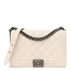 This is an authentic CHANEL Calfskin Double Stitch New Medium Boy Flap in White. This stylish shoulder bag is crafted of luxuriously soft diamond quilted calfskin leather with linear quilted sides in white. The bag features a ruthenium chain link shoulder strap with a broad leather shoulder pad and a Boy squared Chanel CC push lock. This opens the full flap to a gray fabric interior with zipper and patch pockets. High-end Quilted Shoulder Bag For Formal Occasions, Elegant Everyday Luxury Quilted Shoulder Bag, Luxury Shoulder Bag With Diamond Quilting For Everyday, Elegant Leather Shoulder Bag With Diamond Quilting, Chic Everyday Luxury Shoulder Bag With Diamond Quilting, Formal Leather Bag With Diamond Quilting, Luxury Rectangular Shoulder Bag With Diamond Quilting, Chic Diamond-quilted Shoulder Bag For Everyday Luxury, Designer Rectangular Shoulder Bag With Diamond Quilting