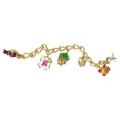 Vintage Verdura Charm Bracelet, 18k Yellow Gold and 18k White Gold For Sale at 1stDibs Monkey Ring, Gold For Sale, Maltese Cross, Topaz Stone, Diamond Set, Gold Wire, Wire Work, Crystal Heart, White Enamel