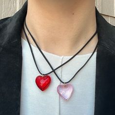 "The Glass Heart Suede String Heart Necklace ❤️💗 Featuring a glass puffy heart pendant (choose color) and a 48\" cut black suede string cord. There are a ton of ways to wear this necklace (you can even wear it as a waist belt!) and if you need a custom length, DM me!  Unisex 🖤 Made with love 🫶" Black Cord Necklace Aesthetic, Heart Glass Necklace, Heart-shaped Glass Necklace For Valentine's Day, Heart-shaped Glass Jewelry For Valentine's Day, Valentine's Day Heart-shaped Glass Necklace, String Heart, Tie Choker, Glass Heart Necklace, Pink Heart Pendant