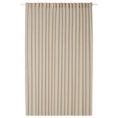 a beige curtain with vertical pleating on the top and bottom, in front of a white