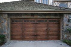 a house with two garage doors on each side