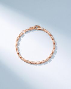 Crafted with 18-karat gold, this block-chain bracelet presents a symphony of four-sided links set with pave white diamonds. The medium, block-chains add a contemporary edge to the timeless design making it perfect for casual or evening wear. Details 18k yellow gold, rose gold or white gold 2.90 carats of pave white diamonds on 7" bracelet 7" inch bracelet is adjustable at 6.5" inches 3.45 carats of pave white diamonds on 8" bracelet 8" inch bracelet is adjustable at 7.5" inches 2.8mm link thickn Block Chain, Jewelry Lookbook, White Diamonds, Pave Diamonds, Gold Rose, Evening Wear, Diamond White, Chain Bracelet, Timeless Design