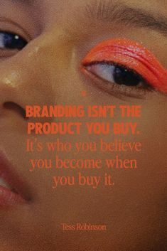 a woman with orange eyeliners on her face and an ad for cosmetics that says, branding isn't the product you buy