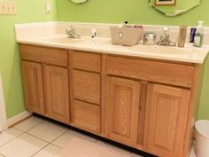 Inexpensive Update For a Builder Grade bathroom cabinet. bathroom cabinet makeover paint before and after inspiration. Make over a bathroom cabinet on a budget with this easy bathroom vanity update tutorial. Stock Cabinets For Bathroom Vanity, Refacing Bathroom Cabinets