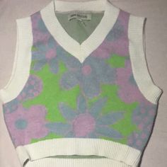 Cropped Sweater. Soft Material. Never Worn. Xs But Could Fit A Small. For Reference I Am Medium And It Fits Snug. This Was My Sister’s, So I Will Not Let It Go For Anything Less Than The Listing Price. Cute V-neck Crop Top For Spring, Y2k Floral Print Top For Spring, Multicolor Y2k Crop Top For Spring, Green Floral Print Casual Crop Top, Casual Green Floral Print Crop Top, Pink Floral Print Y2k Tops, Cute Pastel Tops For Spring, Y2k Style Pink Crop Top For Spring, Pink Y2k Crop Top For Spring