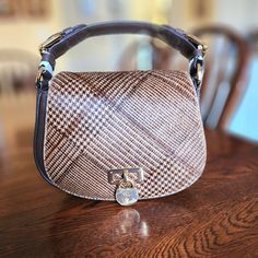 A Combination Of Soft Glen Plaid Haircalf And Supple Full-Grain Leather By Lauren Ralph Lauren Is A Versatile Must-Have Crossbody Or Shoulder Bag Bag Size; 8"W X 6"H X 3"D (Width Is Measured Across The Bottom Of Handbag). 4" Top Handle; 23-1/2" Adjustable Webbed Crossbody Strap Magnetic Closure Interior And Back Slip Pockets Dust Bag Included Absolutely Gorgeous Look And Feel. The Picture Showing Inside Of Purse Contained Packaging Better Left In For Trip To Your Home. Open To Reasonable Offers. Ralph Lauren Leather Crossbody Shoulder Bag, Luxury Saddle Bag With Leather Handles In Tote Shape, Luxury Leather-handled Crossbody Saddle Bag, Luxury Saddle Bag With Leather Handles Crossbody, Luxury Leather-handled Saddle Tote Bag, Luxury Saddle Bag With Leather Handles Tote Shape, Luxury Saddle Bag Tote With Leather Handles, Elegant Brown Saddle Bag With Leather Handles, Ralph Lauren Leather Bags With Adjustable Strap