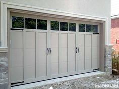 an image of a garage door with windows