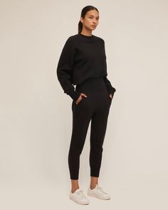 With its exaggerated high ribbed waistband, our So High Waisted Sweatpants is as flattering as you can get in lounge bottoms. Pair them with your favorite crop top or for an additional styling option, fold the extra high waist band down. High-waist fit Ribbed trim at waistband and hem Functional front slant pockets French Terry loop-back interior Inseam: 27” on size 2 100% Cotton Model is 5'10 and wearing a size S. This style runs true to size. We would recommend taking your regular size. High Stretch Ribbed Athleisure Pants, Versatile Fitted Ribbed Bottoms, Sporty Solid Ribbed Pants, Athleisure Ribbed Yoga Pants, Ribbed Athleisure Yoga Bottoms, Athleisure Yoga Ribbed Pants, Versatile Sweatpants With Ribbed Waistband And Tapered Leg, Black Sweatpants For Elevated Casual Occasions, Versatile Cropped Bottoms For Loungewear