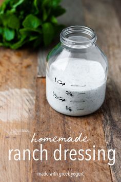 homemade ranch dressing made with greek yogurt in a jar on a wooden table