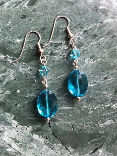 Rich aquamarine blue crystal oval beads shimmer and shine, adding a touch of class to any outfit.  These earrings are just the right accessory for a casual or formal event. Light Blue Faceted Beads Elegant Jewelry, Blue Faceted Oval Beads Jewelry, Elegant Blue Oval Beads Jewelry, Elegant Blue Faceted Crystal Earrings, Elegant Light Blue Jewelry With Faceted Beads, Elegant Blue Oval Beaded Jewelry, Elegant Turquoise Crystal Earrings Nickel Free, Elegant Aquamarine Faceted Beads Jewelry, Elegant Turquoise Nickel-free Crystal Earrings