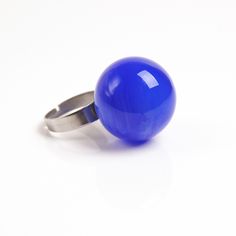 This joyful statement Blue ball ring can be a shining addition to your outfit or simply a unique note, matching your mood and individuality! Dimensions: the ring is adjustable. The bead is 20-22mm (about 0.8-0.9 inch) in diameter. Materials: artist lampwork bead, hypoallergenic stainless steel ring band. Colors used: blue. Please, note, each bead is made by hand and may differ slightly. All the photos that are represented in the item description, are images of different items, made at different Trendy Blue Ring For Parties, Trendy Blue Party Ring, Nickel Free Adjustable Rings For Parties, Adjustable Nickel-free Rings For Party, Clear Bracelet, Bubble Ring, Glass Bubble, Blue Ball, Cool Gifts For Women