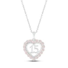 A stunning surprise for the birthday girl, this 10K white gold Quinceañera necklace features a heart with the number 15 at the center. Shimmering lab-created opals trace the heart, making the necklace an ideal gift for an October birthday. The pendant sways from an 18-inch cable chain that secures with a spring-ring clasp. Silver Heart Necklace With Hallmark For Birthday, White Gold Jewelry For Mother's Day Birthday, White Heart-shaped Jewelry For Birthday, White Heart Pendant Jewelry For Birthday, White Necklace With Heart Charm For Birthday, White Gold Birthstone Necklace For Anniversary On Mother's Day, Sterling Silver Birthstone Necklace For Birthday Gift, Birthday Heart Cut Birthstone Jewelry, Heart Cut Birthstone Jewelry For Birthdays