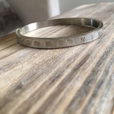 Silver Roman Numeral Bangle. Stainless Steel Plated With Rhodium. Won't Tarnish And Fits Small To Medium Wrists. 2.5" In Diameter. Also Available In Rose Gold And Gold. New Boutique Item. Colorful Bead Bracelets, Fork Bracelet, Rose Gold And Gold, Pave Bracelet, Gold Plated Bangles, Open Bangle, Natural Stone Bracelets, Bridesmaid Bracelet, Jade Bracelet