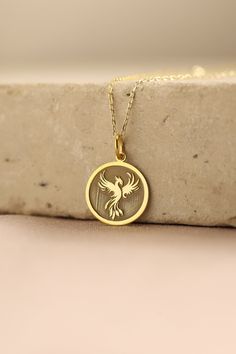 Gold Phoenix Pendant - Phoenix Gold Necklace ● Material of pendant: Solid Gold 14k ( REAL GOLD ) ● Metal Stamp: 14k ( REAL GOLD ) ● The pendant is available in 5 sizes: - 12,7 mm / 0.5 inches (Diameter) - 14,0 mm / 0,55 inches ( Diameter ) In the photos - 15,3 mm / 0.6 inches ( Diameter ) - 16,5 mm / 0,65 inches ( Diameter ) - 19,1 mm / 0,75 inches ( Diameter ) ( In the photos the size is 14mm / 0.55 inches Diameter ) ( Jump Ring inner diameter: 4 mm ) ● Material of chain: Solid gold 14k ( REAL Phoenix Necklace Pendants, Phoenix Jewelry Necklaces, Phoenix Ring, Phoenix Jewelry, Gold Pendent, Phoenix Necklace, Phoenix Pendant, Eagle Necklace, Phoenix Bird