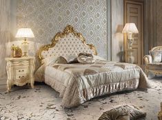 a fancy bedroom with an ornate bed and matching chairs