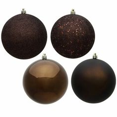 three brown and one black christmas ornaments