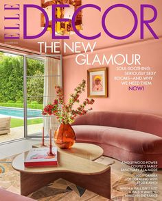 the cover of the december issue of the decor magazine, featuring a pink couch and coffee table