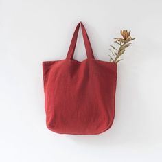 Introducing the Large Linen Bag – your ideal partner for shopping marathons, trips to the farmers market, or sunny beach days. Combining style and functionality, this spacious bag offers comfort with its easy-to-carry straps. Crafted from 100% natural linen, it embodies sustainability. Key Features: Generous size (Width: 54 cm / 21", Length: 60 cm / 24", Handles: 50 cm / 20") accommodates all your essentials. Versatile carrying options with lightweight fabric and long handles – hand-held or over Casual Linen Canvas Bag For Travel, Casual Natural Linen Canvas Bag, Natural Linen Tote Canvas Bag, Casual Linen Bag For Everyday Use, Casual Linen Bag For Daily Use, Summer Linen Shoulder Bag For Everyday Use, Red Summer Bag For Everyday, Linen Tote Shoulder Bag For Travel, Summer Canvas Bags With Rolled Handles