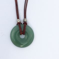 A personal favorite from my Etsy shop https://www.etsy.com/listing/471822384/green-adventurine-gemstone-necklace Aventurine Amulet Necklace For Gifts, Aventurine Gemstone Round Pendant Necklace, Adjustable Round Aventurine Necklace, Aventurine Necklace For Meditation, Necklace Board, Wire Weaving Tutorial, Green Aventurine Necklace, Beaded Macrame, Energy Jewelry