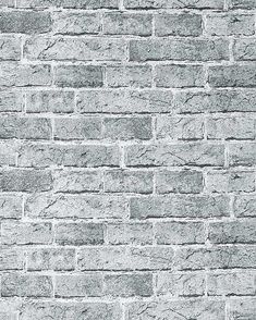 a gray brick wall textured with cement