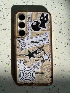 an iphone case with various stickers on it