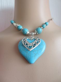 Pendant-Turquoise-Bohemian Silver Heart Pendant -Turquoise-Tibetan Silver- Ethnic Jewellery -gift 16 ins - can be extended See my shop at https://Merlinscaveshop.com A PERFECT PLACE TO FIND THAT SOMETHING SPECIAL FOR SOMEONE Bohemian Blue Heart Pendant Jewelry, Blue Bohemian Heart Pendant Jewelry, Adjustable Bohemian Heart Pendant Jewelry, Bohemian Turquoise Heart Pendant Jewelry, Turquoise Necklace With Heart Beads As Gift, Turquoise Heart Beads Necklace As Gift, Adjustable Bohemian Heart-shaped Jewelry, Bohemian Turquoise Jewelry With Heart Beads, Bohemian Turquoise Necklace With Heart Beads