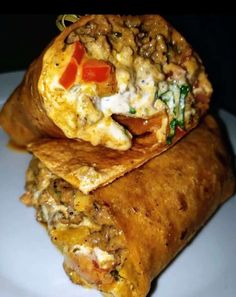 two burritos stacked on top of each other