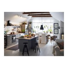 the kitchen is clean and ready to be used as a dining room or family room