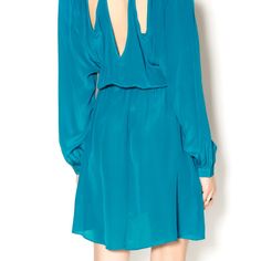 Gorgeous Lightweight Long Sleeve Wrap Dress With Elastic Waist And Shoulder And Back Details. Very Low-Cut, Wear With A Cute Bralette Or Pair With Fashion Tape So You Don't Have A Peek-A-Boo Moment. Fabric: 100% Silk. Dry Clean Only. Label: S.Y.L.K. Turquoise V-neck Mini Dress, Casual Style, Turquoise V-neck Mini Dress Casual, Chic Turquoise Mini Dress For Spring, Casual Turquoise V-neck Mini Dress, Turquoise Flowy Long Sleeve Dress, Blue Flowy Chic Mini Dress, Blue Long Sleeve Mini Dress For Daywear, Chic Long Sleeve Turquoise Dress, Chic Turquoise Long Sleeve Dress