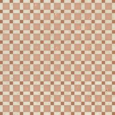 a brown and white checkerboard pattern is seen in this image, it appears to be very old