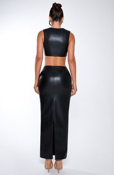 Amp up the drama in Odetta, a sleek, sexy maxi cut from soft faux leather with a mid rise fit, pencil shaped skirt and split to the centre back. Style her up with the Amaya crop or a bodysuit. 



Colour: Black.

Premium faux leather with slight stretch.

Fully lined.

Mid rise.

Pencil shaped skirt.

Split to centre back.

Invisible zip fastening.

Maxi length.

Model is an XS and is wearing an XS.

 Size: XS, S, M, L, XL, XXL Split Long Dress, Loungewear Dresses, Maxi Dress Sale, Maxi Dress Navy, Invisible Zip, The Drama, Formal Party, Dress Pant, Black Maxi Dress