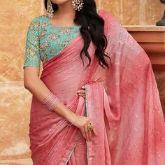 Peach colored saree is made from chiffon fabric which is highlighted with sequins embroidered work as shown. Comes along with unstitched embroidered georgette blouse piece which you can customise as per your design/style. Occasion - You can wear this saree for festive and functions. Note:- the actual product may differ slightly in color and design from the one illustrated in the images when compared with computer or mobile screen. Measurements: Saree : Chiffon : 5.5 Mtrs Blouse : Chiffon : 0.8 Mtr Material: Chiffon Stitch Type: Unstitched Country of Origin: India Care Guide: Dry Clean Pink Georgette Blouse With Sheer Dupatta, Pink Chinon Pre-draped Saree For Navratri, Peach Semi-stitched Saree For Navratri, Pink Georgette Blouse With Dupatta, Peach Blouse Piece With Pallu For Navratri, Pink Anarkali Blouse With Sheer Dupatta, Navratri Peach Blouse Piece With Pallu, Party Wear Georgette Blouse Piece For Eid, Party Wear Chiffon Saree With Sheer Dupatta