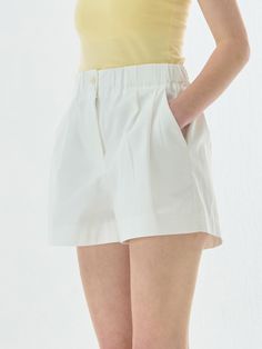 This product is the Cotton Banding Short Pants, designed to offer both style and comfort for everyday wear. The pants feature an elastic waistband that ensures a secure and comfortable fit, while the relaxed silhouette allows for easy movement. These shorts are perfect for casual outings, providing a versatile and chic option for warm weather. - These Cotton Banding Short Pants feature an elastic waistband for a secure and comfortable fit.- The relaxed silhouette allows for easy movement and comfort throughout the day.- Crafted from high-quality cotton, these shorts offer breathability and durability.- Ideal for casual outings, they provide a versatile and chic option for warm weather. Versatile High-waisted Shorts With Elastic Waistband, Versatile Relaxed Fit Shorts For Day Out, Versatile Short Bottoms For Day Out, Versatile High-waisted Shorts For Day Out, Everyday Bottoms With Comfort Waistband, Versatile Short Length Bottoms For Day Out, Versatile Relaxed Fit Solid Color Shorts, Chic Cotton Pants With Built-in Shorts, Spring Bottoms With Comfort Waistband, Short Length