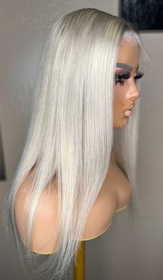 Transform your look with our 13x6 HD Invisible Lace Wig! Made with 100% human hair, this 14-16 inch long wig comes in a stunning pearl blonde color that can be cut and styled to your liking. The adjustable straps and elastic band inside the wig cap ensure a perfect fit for an average head size. Elevate your style with ease and confidence. Platinum Blonde Wig, Bartender Outfit, Pearl Blonde, Hairstyle Tips, White Blonde Hair, Hairstyle Idea, Invisible Lace, White Blonde, Style Aesthetic