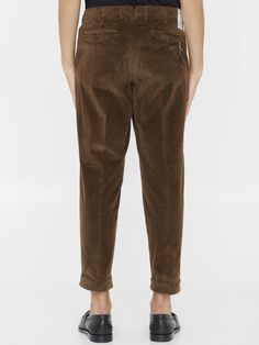 Straight-leg trousers in brown corduroy. It features zip, button and hook-and-eye closure, two side welt pockets, two rear buttoned flap pockets and belt loops. Regular fit. The model is 184cm tall and wears size IT 48.  Size nationality: IT  Product number: 39657252  Product code: CORSZAZ40FWDTU87N175  Composition: 75% cotton, 24% lyocell, 1% elastane Brown Corduroy Bottoms With Belt Loops, Brown Corduroy Pants For Work, Brown Corduroy Tapered Leg Bottoms, Brown Tapered Leg Corduroy Pants, Brown Corduroy Tapered Pants, Brown Corduroy Bottoms With Button Closure, Corduroy Work Pants With Button Closure, Corduroy Pants With Button Closure For Work, Comfortable Trousers