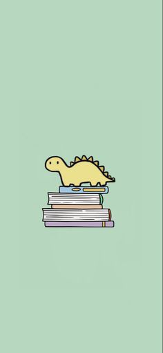 a dinosaur is sitting on top of some books and has his head resting on the stack of books